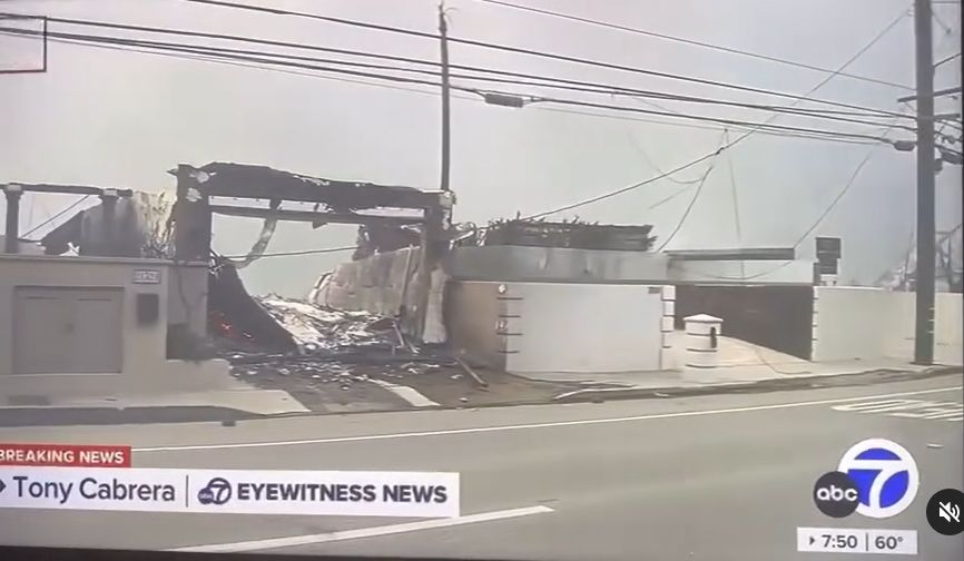 Paris Hilton watched her burning house on television.
