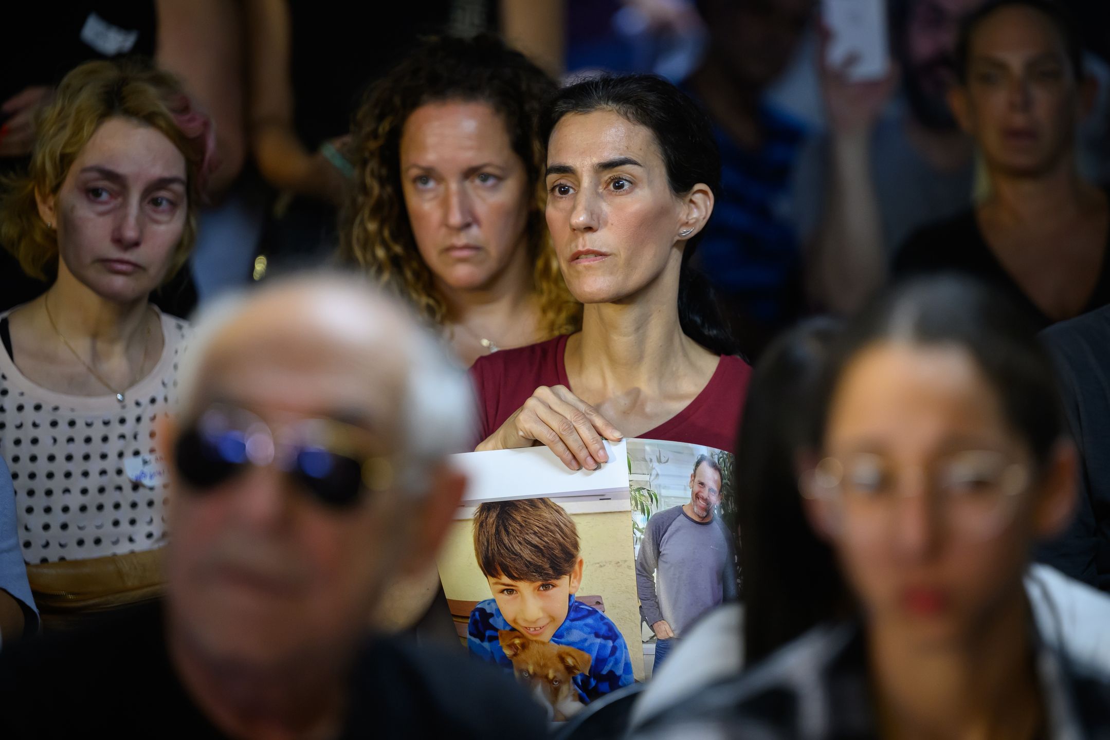 Israel Declares War Following Large-Scale Hamas AttacksTEL AVIV, ISRAEL - OCTOBER 13: Family and friends of those taken hostage by Hamas during an attack on Israel react as they listen to speeches during a press conference on October 13, 2023 in Tel Aviv, Israel. Israel has sealed off Gaza and launched sustained retaliatory air strikes, which have killed at least 1,400 people with more than 300,000 displaced, after a large-scale attack by Hamas. On October 7, the Palestinian militant group Hamas launched a surprise attack on Israel from Gaza by land, sea, and air, killing over 1,300 people and wounding around 2,800. Israeli soldiers and civilians have also been taken hostage by Hamas and moved into Gaza. The attack prompted a declaration of war by Israeli Prime Minister Benjamin Netanyahu and the announcement of an emergency wartime government.  (Photo by Leon Neal/Getty Images)Leon Neal