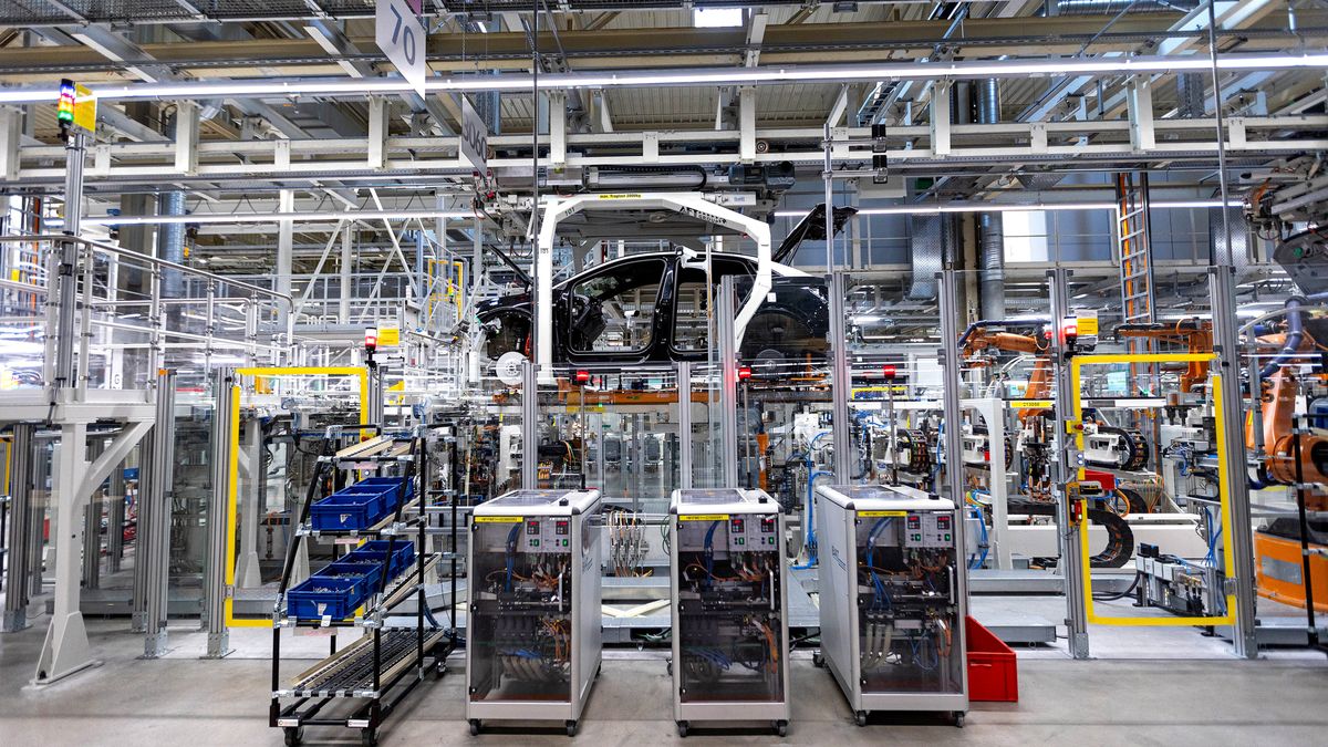 The body of a Volkswagen AG (VW) ID.5 electric sports utility vehicle (eSUV) on the assembly line at the automaker's electric automobile plant in Zwickau, Germany, on Tuesday, April 26, 2022. The Zwickau assembly lines are the centerpiece of a plan by VW, the world's biggest automaker, to manufacture as many as 330,000 cars annually. Photographer: Krisztian Bocsi/Bloomberg via Getty Images