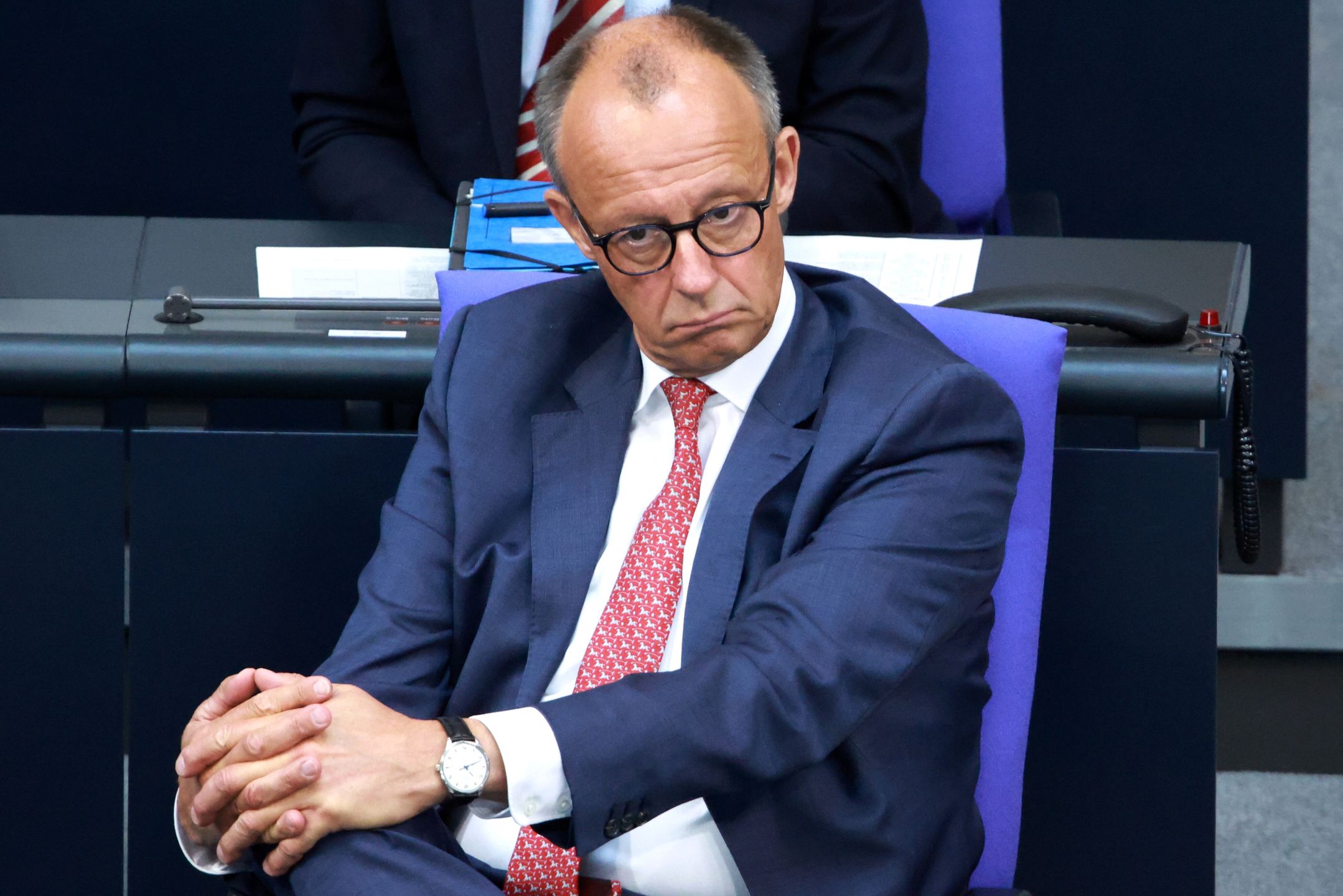 German Chancellor Friedrich Merz looks on during a session of the German parliament 'Bundestag' to present the draft budget for 2025, in Berlin, Germany, 08 July 2025. EPA/CLEMENS BILAN Dostawca: PAP/EPA.