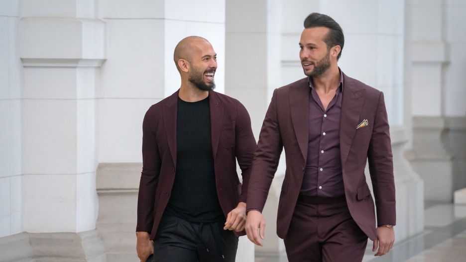 BUCHAREST, ROMANIA - OCTOBER 15: Andrew Tate (left) and his brother Tristan Tate walk inside the Court of Appeal on October 15, 2024 in Bucharest, Romania. Social Media Influencer Andrew Tate and his brother Tristan are appearing in court to appeal a decision to proceed with their trial on charges of rape, human trafficking and forming a criminal gang to exploit women. The Tate brothers were arrested on December 29, 2022, alongside Georgiana Naghel and Luana Radu as part of an investigation into human trafficking and rape. (Photo by Andrei Pungovschi/Getty Images)