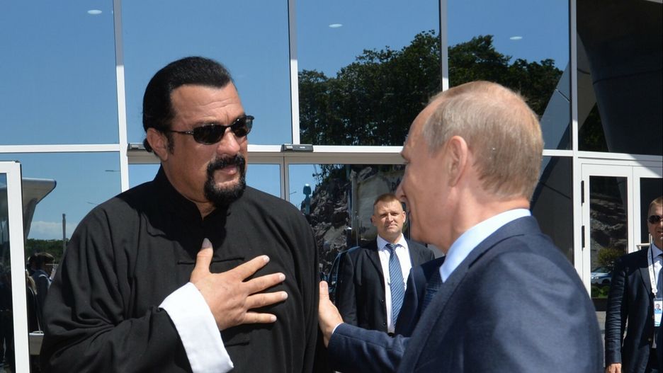 arch19Russian President Vladimir Putin, right, speaks with U.S. actor Steven Seagal after visiting an oceanarium on Russky Island where the East Economic Forum takes place in the Russian Far Eastern port of Vladivostok, Friday, Sept. 4, 2015. (Alexei Druzhinin/RIA-Novosti, Kremlin Pool Photo via AP)POOL RIA NOVOSTI KREMLIN