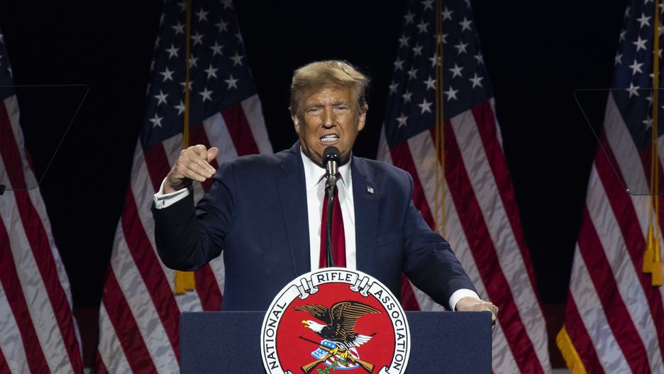 Former US President Donald Trump speaks during the National Rifle Association (NRA) Great American Outdoor Show Presidential Forum in Harrisburg, Pennsylvania, US, on Friday, Feb. 9, 2024. Trump is on the cusp of clinching the GOP nomination, a contest he has sought to wrap up quickly so that he can pivot to running against President Joe Biden, even as a series of court cases threaten to keep the former president from the trail. Photographer: Joe Lamberti/Bloomberg via Getty Images