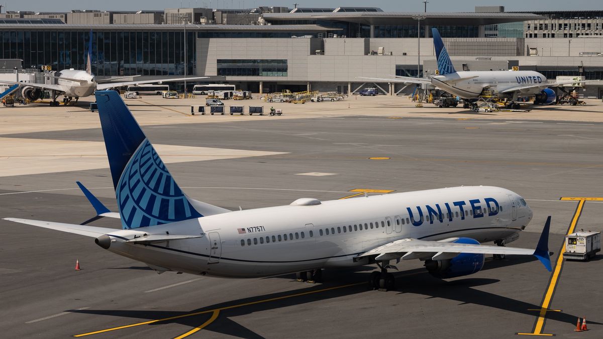 A Boeing Boeing 737 MAX passenger aircraft, operated by United Airlines Holdings Inc., on the tarmac at Newark Liberty International Airport (EWR) in Newark, New Jersey, US, on Monday, June 2, 2025. A runway at Newark Liberty International Airport that's been under construction and is partially responsible for some of the disruptions there will reopen Monday, the Port Authority of New York and New Jersey announced Friday. Photographer: Yuki Iwamura/Bloomberg via Getty Images