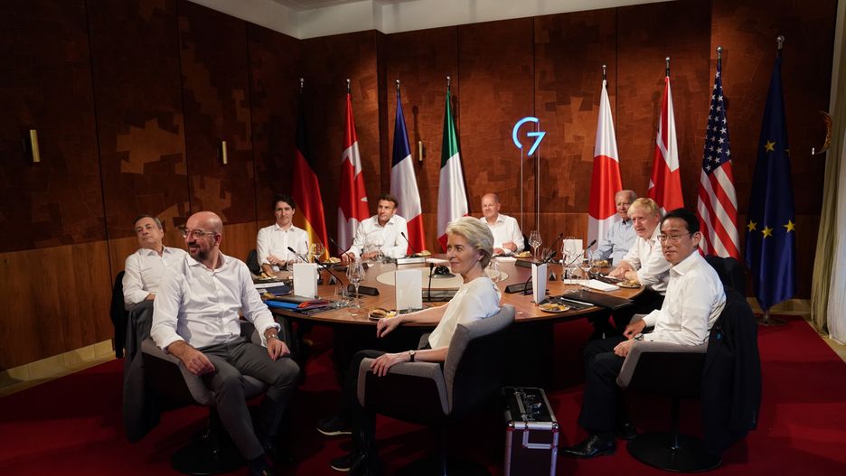 GARMISCH-PARTENKIRCHEN, GERMANY - JUNE 26: G7 leaders, (clockwise from front) European Union Council Commission President Ursula von der Leyen, European Union Council President Charles Michel, Prime Minister of Italy Mario Draghi, Prime Minister of Canada Justin Trudeau,  French President Emanuel Macron, German Chancellor Olaf Scholz, US President Joe Biden, Prime Minister Boris Johnson and Prime Minister of Japan Fumio Kishida, at a working session dinner during the G7 summit in Schloss Elmau, on June 26, 2022 near Garmisch-Partenkirchen, Germany. Leaders of the G7 group of nations are officially coming together under the motto: "progress towards an equitable world" and will discuss global issues including war, climate change, hunger, poverty and health. Overshadowing this year's summit is the ongoing Russian war in Ukraine. (Photo by Stefan Rousseau - Pool/Getty Images)