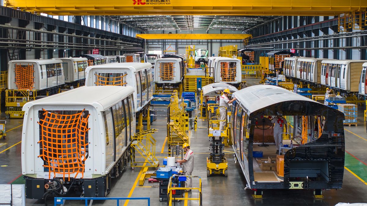 WUHU, CHINA - SEPTEMBER 19: Workers manufacture driverless trains at a factory of CRRC Puzhen Alstom Transportation Systems Ltd Co on September 19, 2024 in Wuhu, Anhui Province of China.  In recent years, Wuhu has actively cultivated a rail transit industry chain cluster and vigorously promoted the high-quality development of the manufacturing industry by supporting digital, intelligent and green transformation. (Photo by Xiao Benxiang/VCG via Getty Images)