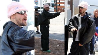 Justin Bieber walczy z opadającymi spodniami i znów AWANTURUJE SIĘ z fotoreporterami (ZDJĘCIA)