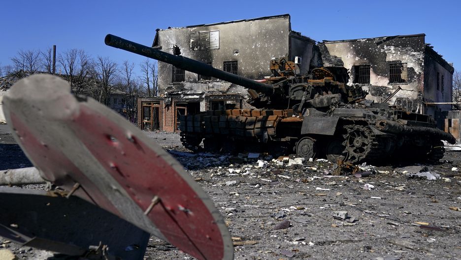 MARIUPOL, UKRAINE - MARCH 21: A damaged military vehicle as civilians are evacuated along humanitarian corridors from the Ukrainian city of Mariupol under the control of Russian military and pro-Russian separatists, on March 21, 2022. (Photo by Stringer/Anadolu Agency via Getty Images)