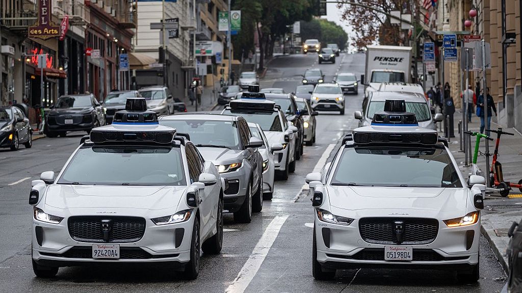 Waymo Seeking Over $15 Billion Near $100 Billion Valuation
Waymo autonomous taxis on Bush Street in San Francisco, California, US, on Wednesday, Dec. 17, 2025. Waymo, Alphabet Inc.'s autonomous driving unit, is in discussions to raise more than $15 billion at a valuation near $100 billion, in a financing round led by its parent company. Photographer: David Paul Morris/Bloomberg via Getty Images
Bloomberg
vehicles, u.s., automotive, transportation and logistics, north american, automobile, vehicle, united states of america, driverless, city transport, autos, san francisco, cars, automobiles, driver-less, american, u.s.a., automotive industry, auto, autonomous vehicle, us, industries, americas, self-driving car, business news