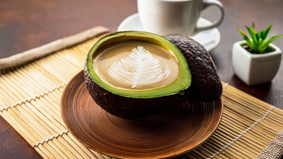 avo-latte, avocado coffee, coffee in avocado, coffee cup, trendy coffee, sustainable drink, eco-friendly coffee, food photography, creative coffee, coffee art, avocado shell, green coffee, natural cup, minimalist coffee, coffee concept, unique drink, plant-based coffee, vegan coffee, healthy coffee, sustainable lifestyle, aesthetic drink, organic coffee, specialty coffee, zero, coffee, cup, drink, breakfast, tea, beverage, hot, cafe, food, brown, espresso, table, white, morning, black, caffeine, mug, cappuccino, spoon, cream, sugar, aroma, wooden, milk, chocolate
