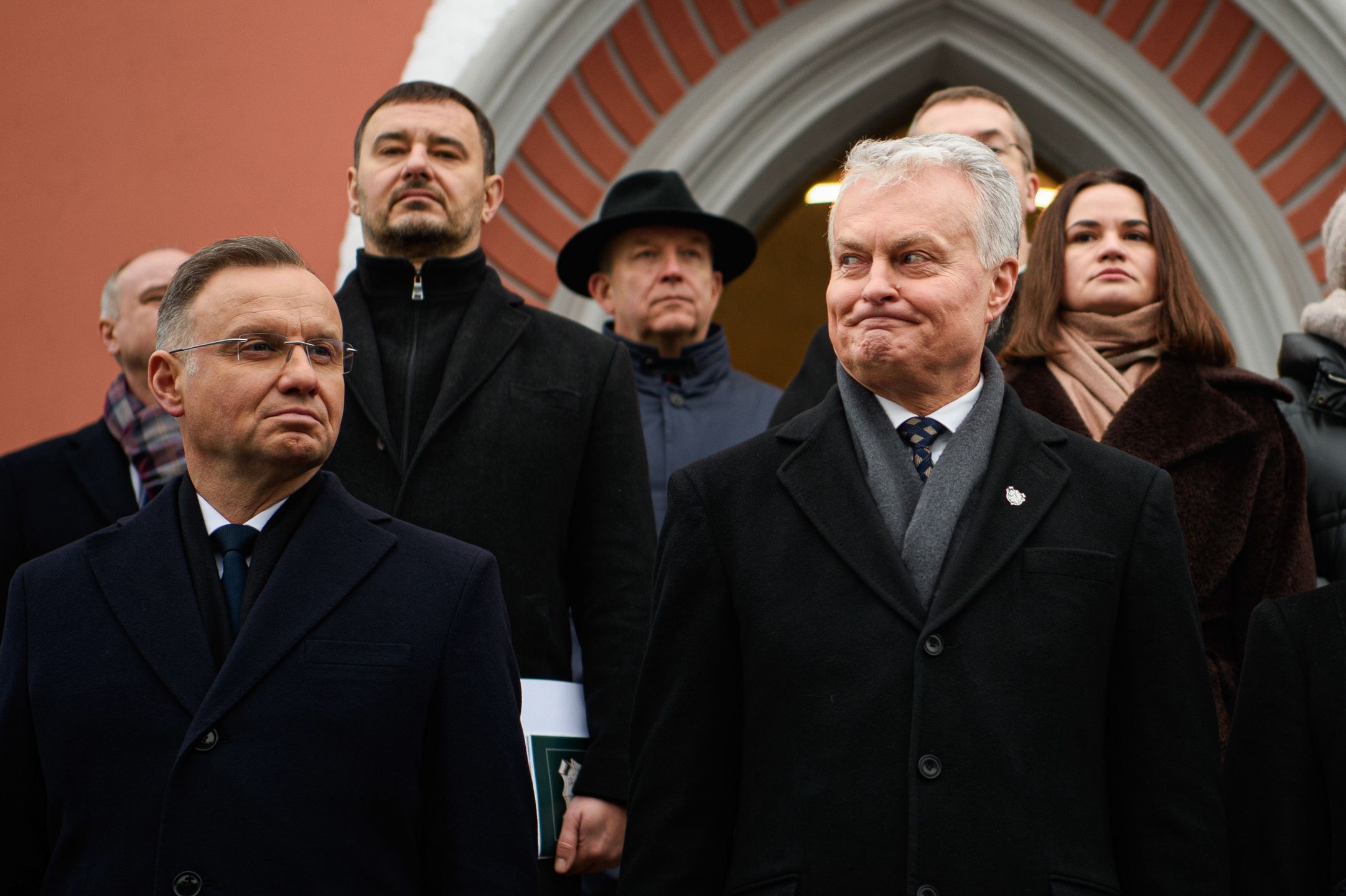 VILNIUS, LITHUANIA - 2024/01/21: Lithuanian President Gitanas Nausda (R), Polish President Andrzej Duda (L), Ukrainian Ambassador in Lithuania Petro Beshta (2nd row, L), and Belarusian opposition leader Sviatlana Tsikhanouskaya (2nd row, R) take part in the 161st anniversary of the January Uprising at the Rasu Cemetery. (Photo by Yauhen Yerchak/SOPA Images/LightRocket via Getty Images)