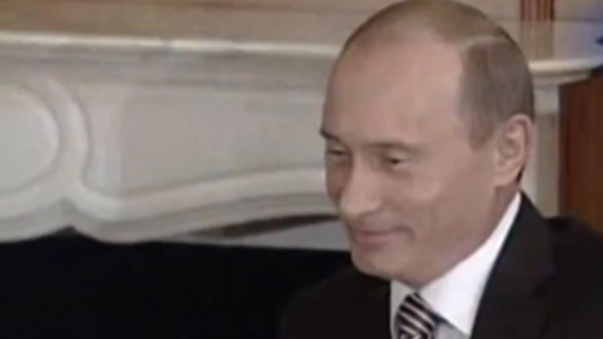 Wyraz twarzy Putina, gdy pies podszedł do Merkel.