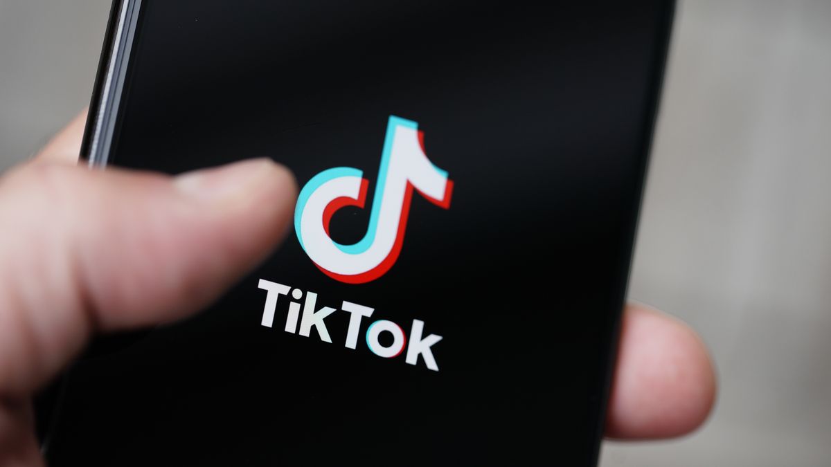 The TikTok logo is seen on an iPhone 11 Pro max in this photo illustration in Warsaw, Poland on September 29, 2020. The TikTok app will be banned from US app stores from Sunday unless president Donald Trump approves a last-minute deal between US tech firm Oracle and TikTok owner ByteDance. US authorities say the Chinese video sharing app threaten national security and could pass on user data to China. (Photo by Jaap Arriens/NurPhoto via Getty Images)