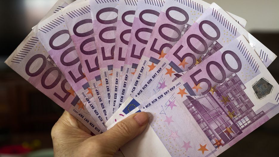 LISBON, PORTUGAL - FEBRUARY 19: In this photo illustration five hundred euros banknotes are on display on February 19, 2023, in Lisbon, Portugal. According to the Bank of Portugal (BdP) it is illegal to be asked for identification when trying to make a payment with 100, 200 or 500 euro banknotes. Banco de Portugal indicates in an answer in frequently asked questions on its official website that "procedures of this kind are contrary to the legal tender of the euro banknote and jeopardize the confidence of the public in the banknotes in circulation." Banco de Portugal also clarifies that "as a rule, euro banknotes and coins must be accepted in all transactions, whatever their nature", which means that the "creditor has a duty to accept any type of banknote or coin and, as a general rule, cannot refuse it." In case of refusal or attempt to identify the person trying to pay using euro banknotes BdP indicates that "you should inform Banco de Portugal if you are confronted with situations of this nature". (Photo Illustration by Horacio Villalobos#Corbis/Corbis via Getty Images)