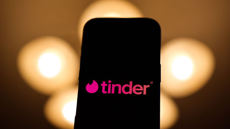 Tinder logo displayed on a phone screen is seen in this illustration photo taken in Poland on December 15, 2024. (Photo by Jakub Porzycki/NurPhoto via Getty Images)