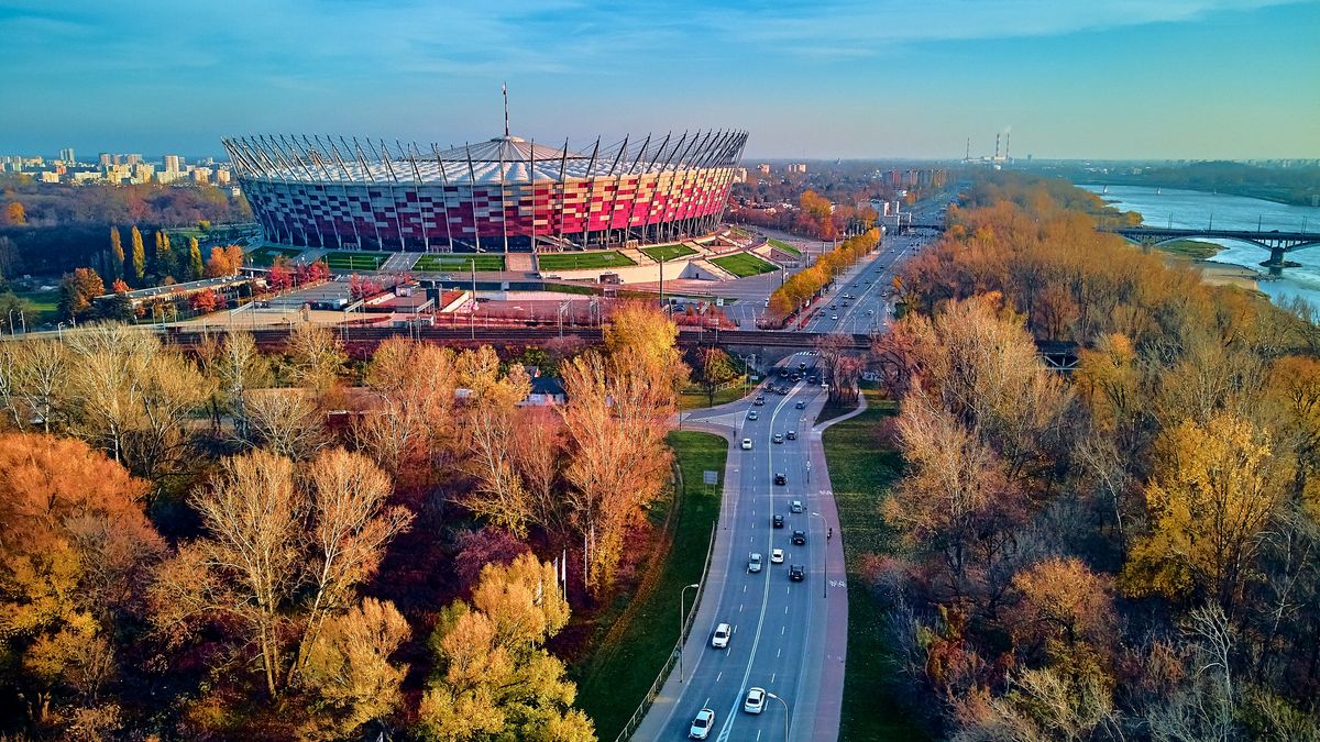 WARSAW, POLAND - NOVEMBER 17, 2019: Beautiful sunset panoramic aerial drone view to panorama of Warsaw modern City with skyscraper and The PGE Narodowy National Stadium (Polish: Stadion Narodowy)
WARSAW, POLAND - NOVEMBER 17, 2019: Beautiful sunset panoramic aerial drone view to panorama of Warsaw modern City with skyscraper and The PGE Narodowy National Stadium (Polish: Stadion Narodowy)
warsaw, poland, travel, view, urban, line, city, way, aerial, buildings, public, sky, landscape, architecture, new, outdoors, day, europe, aero, fly, flight, bird, roof, drone, air, cross, polish, panoramic, cityscape, modern, skyscraper, high-rise, contemporary, development, high construction, glass, elevation, sun, window, flash, construction, height, extreme, unusual, extraordinary, Stadium, National, Narodowy, PGE, skylines, warsaw, poland, travel, view, urban, line, city, way, aerial, buildings, public, sky, landscape, architecture, new, outdoors, day, europe, aero, fly, flight, bird, roof, drone, air, cross, polish, panoramic, cityscape, modern, skyscraper, high-rise, contemporary, development, high construction, glass, elevation, sun, window, flash, construction, height, extreme, unusual, extraordinary, stadium, national, narodowy, pge, skylines