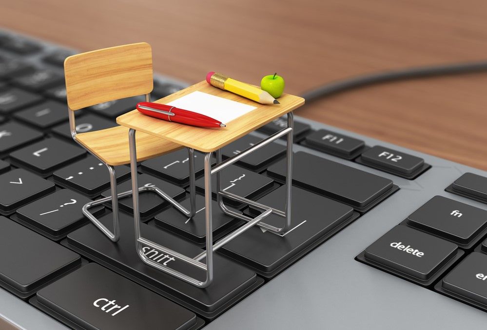 Zdjęcie Desk and chair on the keyboard pochodzi z serwisu Shutterstock