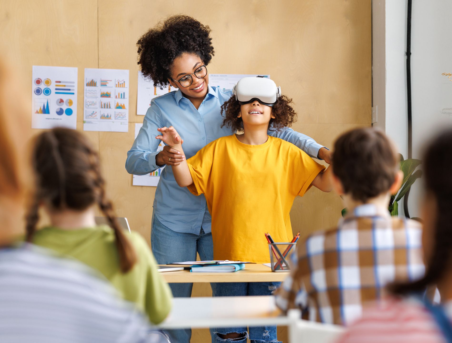 Innovation in education. Student schoolgirl in virtual reality glasses together with teacher during lesson in classroom at school
Innovation in education. Student schoolgirl  in virtual reality glasses together with teacher during lesson in bright classroom at school
education, classroom, school, technology, vr, class, innovation, virtual, reality, children, 3d, glasses, boy, lesson, digital, student, headset, entertainment, young, learning, science, girl, device, goggles, futuristic, knowledge, simulation, studying, teacher, happy, gesture, child, childhood, tech, female, experience, pupil, kid, computer, college, augmented, teacher, modern, learn, study, multinational, elementary, vision, teenager, playing, education, classroom, school, technology, vr, class, innovation, virtual, reality, children, 3d, glasses, boy, lesson, digital, student, headset, entertainment, young, learning, science, girl, device, goggles, futuristic, knowledge, simulation, studying, teacher, happy, gesture, child, childhood, tech, female, experience, pupil, kid, computer, college, augmented, modern, learn, study, multinational, elementary, vision, teenager