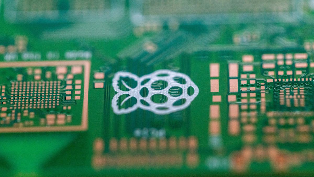 A raspberry logo on a printed circuit board (PCB) for Raspberry Pi personal computers on the production line at the Sony UK Technology Centre in Pencoed, UK, on Friday, Feb. 2, 2024. Personal computer maker Raspberry Pi appointed bankers at Peel Hunt and Jefferies to prepare a London initial public offering, a listing that would be a win for the UK capital after an exodus of companies to the US. Photographer: Chris Ratcliffe/Bloomberg via Getty Images