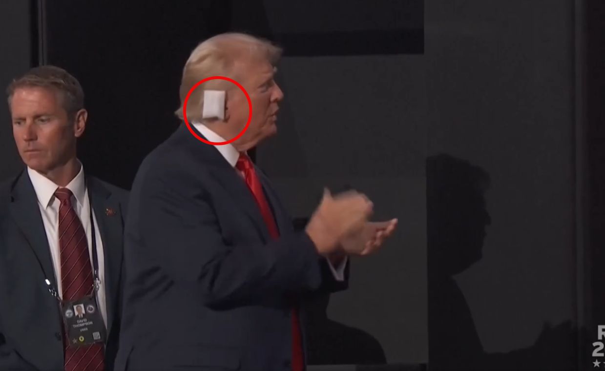 Trump appeared for the first time after the assassination attempt. A bandage is visible.