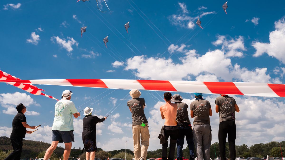 ''Sky Wonders 2024'' International Kite Festival starts in Varna, Bulgaria, on August 24, 2024. Dozens of kites of different sizes and models fill the sky over Asparuhovo Beach on a sunny Saturday. The 12th edition of the kite festival is held over the weekend in the so-called Black Sea Capital of Bulgaria, Varna. (Photo by Denislav Stoychev/NurPhoto via Getty Images)