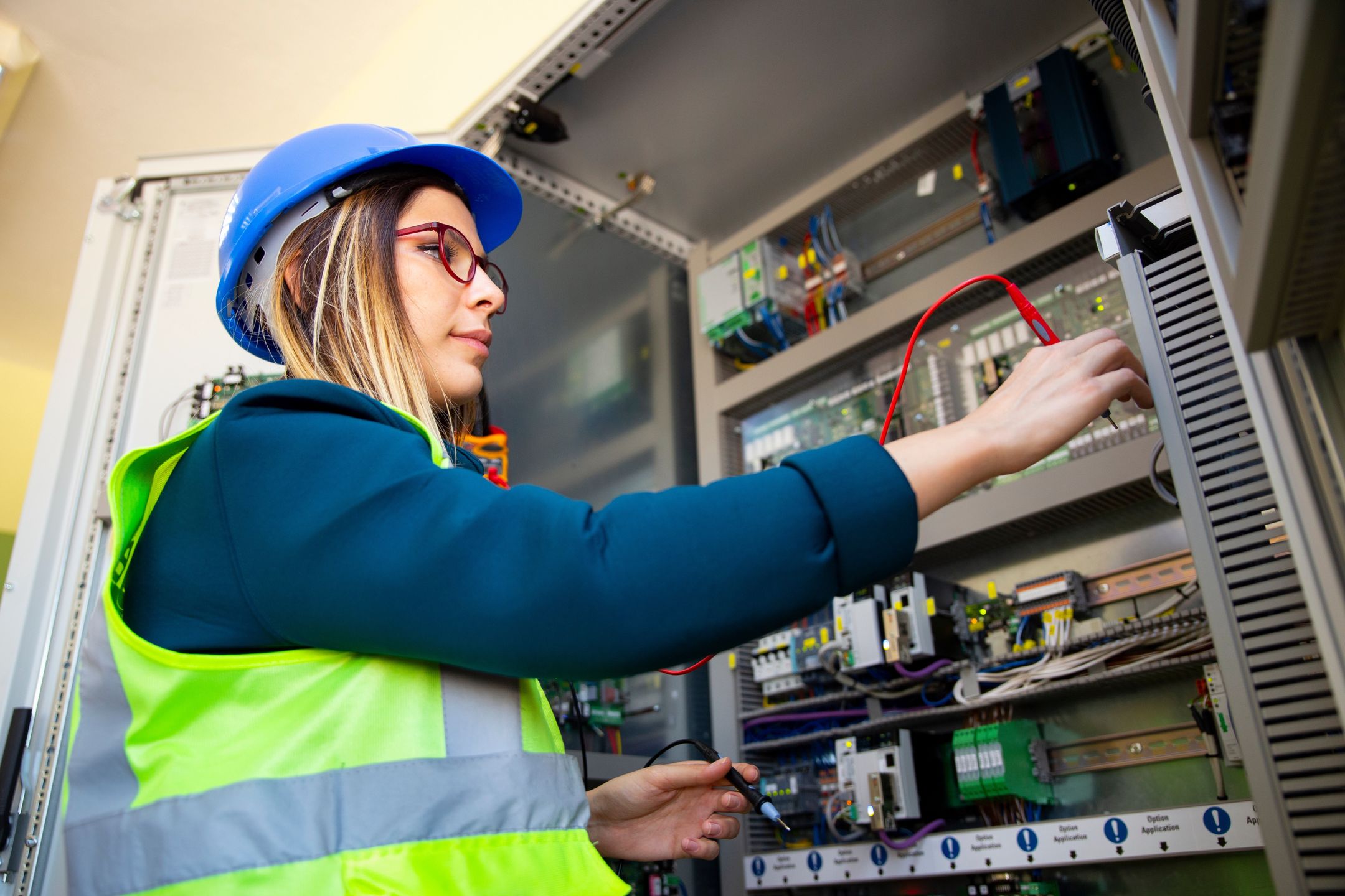 adult, analyzing, cable, control, electric meter, electrical component, electrician, electricity, engineer, equipment, examining, expertise, factory, industry, inspector, instrument of measurement, looking, machine part, maintenance engineer, manual worker, multi meter, one person, only women, people, power supply, problems, professional occupation, protective work wear, repairing, service, technician, technology, work tool, working, worker, work, safety, machine, helmet, person, computer, business, occupation, mechanic, job, panel, maintenance, female, woman, young