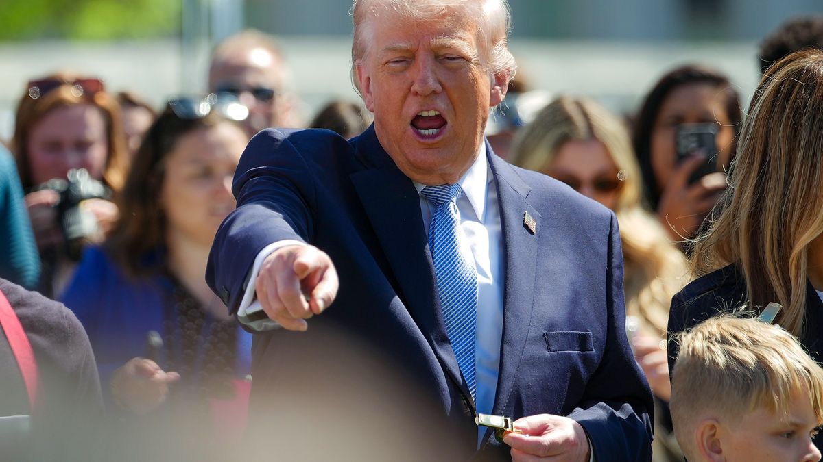 WASHINGTON, DC - APRIL 06: U.S. President Donald Trump watche children roll Easter eggs during the White House Easter Egg Roll on the South Lawn of the White House on April 06, 2026 in Washington, DC. The Easter Egg Roll is a White House tradition dating back to 1878. The Trumps also honored the 250th anniversary of the United States during the event. (Photo by Andrew Harnik/Getty Images)
