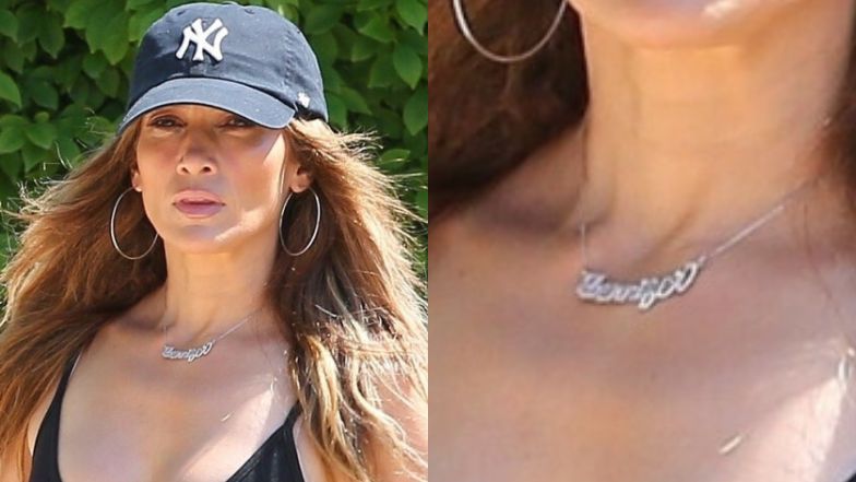 Jennifer Lopez and her new necklace "Jennifer".