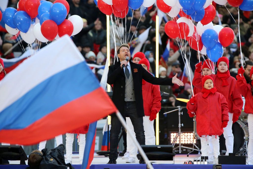 President Putin Addresses Supporters On Anniversary Of Annexation Of CrimeaMOSCOW, RUSSIA - MARCH 18: (RUSSIA OUT) Russian pop singer Nikolai Baskov performs during a concert marking the anniversary of the annexation of Crimea, on March 18, 2022 in Moscow, Russia. Thousands people gathered at Luznkiki Stadium to support President Putin, the annexation of Crimea and the conflict in Ukraine. (Photo by Getty Images)Contributor
