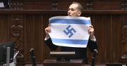 Awantura w Sejmie. Berkowicz wyciągnął flagę Izraela ze swastyką