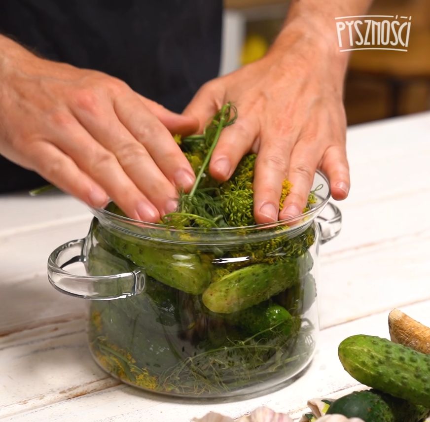 Lightly salted cucumbers in a pot