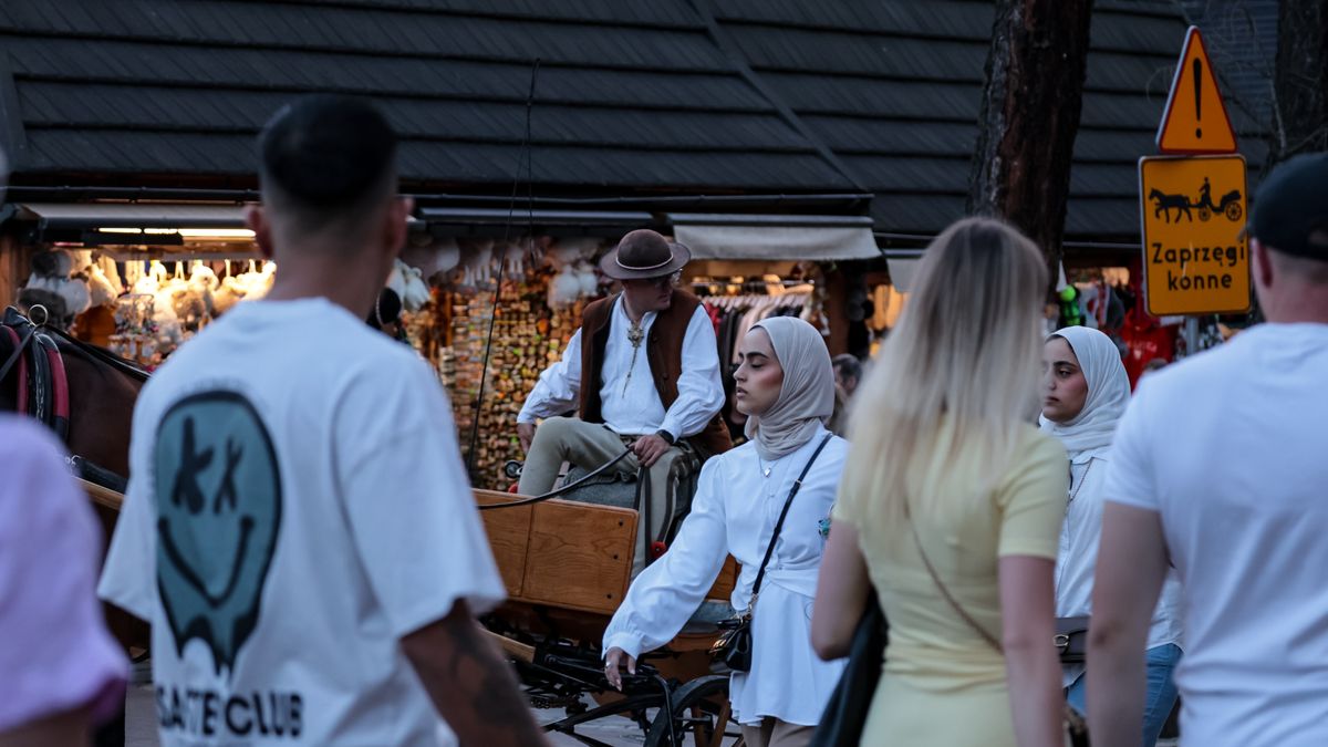 Crowds Of Tourism Visit Zakopane In Poland
A Muslim family walks on landmark Krupowki Street in Zakopane, Poland, as the Arab Peninsula Muslim tourists come in numbers to Poland and choose Zakopane as its favorite destination - August 8, 2025. Zakopane is a gate-town to Tatra National Park, the 2024 world's most visited National Park. (Photo by Dominika Zarzycka/NurPhoto via Getty Images)
NurPhoto
august 8, krupowki, editorial, krupowki street, tourist destination, lifestyle, arab peninsula, holiday, muslim family, muslim tourists, gate-town, favorite destination, daily life, podhale, colour image, landmark, muslim, heatwave