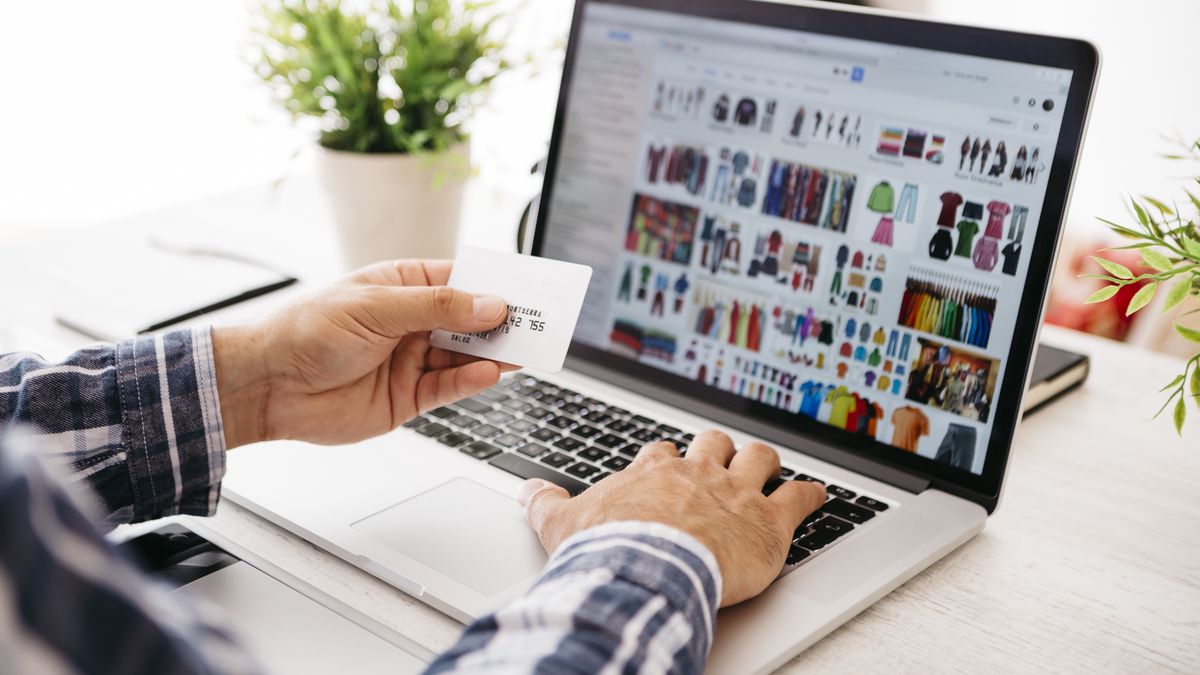Man with laptop and credit card shopping online, partial view""Westend61laptop, credit card, paying, computer, finances, banking, payment, typing, entering, desk, on-line, Table, caucasian appearance, mid adult men, 35-39 years, one person, hand, forearm, Mobility, technology, lifestyle, Wireless Technology, using laptop, accessibility, Internet, choosing, convenience, choice, Lifestyles, Graphics tablet, online shopping, Shopping, display, Part Of, focus on foreground, man, clothing, close up, indoor, potted plant, keyboard, wireless lan, digital, Spain, ordering, leisure, people, Adults, mid adult, arm, communication, buying, Plant