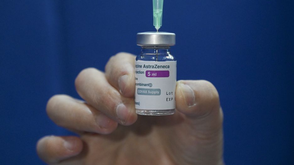 A Malaysian health worker shows the empty vial of the AstraZeneca  Covid-19 vaccine at a special vaccination center set up at the Universiti Kebangsaan Malaysia in Bangi, Malaysia on Wednesday, May 5, 2021. Malaysia is allowing people to use AstraZeneca's Covid vaccine on a voluntary basis and has excluded the shots from its inoculation program amid public concerns about their safety. (Photo by Zahim Mohd/NurPhoto via Getty Images)