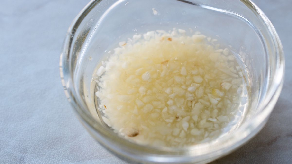 Turkish Style Chopped Garlic Sauce for Soups in Glass CupTurkish Style Chopped Garlic Sauce for Soups in Glass Cup. Traditional Organic Food.alpaksoy