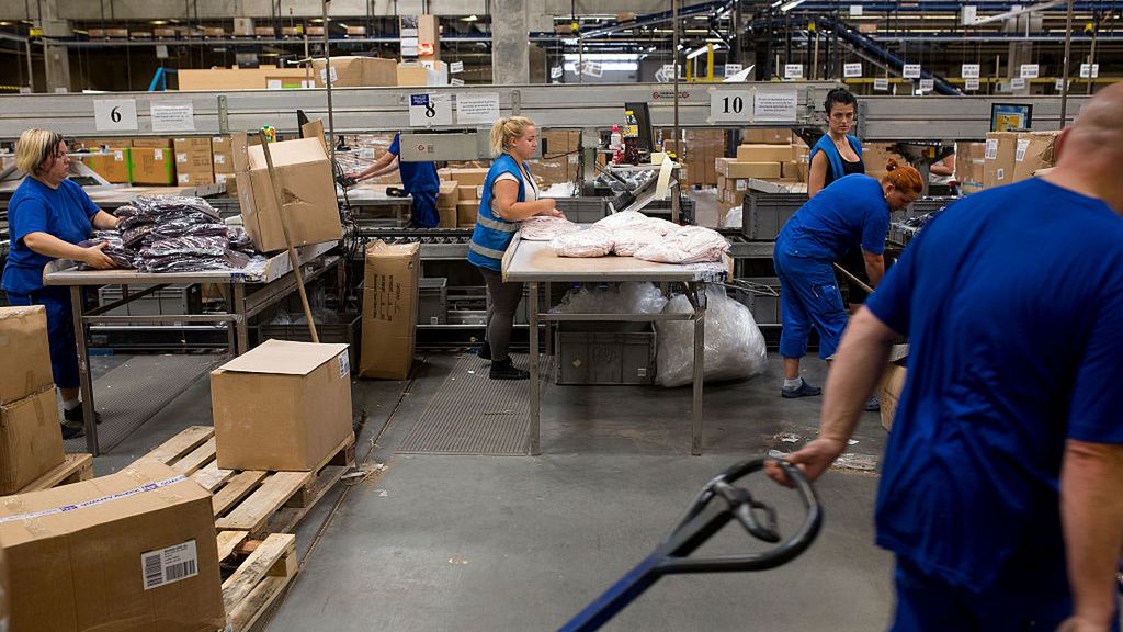 Operations At Poland's Biggest Clothes Retailer LPP SA
Employees prepare clothing items for distribution on the processing line in the logistics center of LPP SA in Pruszcz Gdanski, Poland, on Thursday, Aug. 13, 2015. LPP is central Europe's biggest publicly-traded clothing retailer. Photographer: Bartek Sadowski/Bloomberg via Getty Images
Bloomberg
EMEA; EUROPE, POLAND; POLISH; EUROPE, MODEL; FASHION; APPAREL, RETAIL; RETAILER; STORE; STORES, FINANCE; FINANCIAL; ECONOMY, ECONOMY; ECONOMIC; ECO, MANUFACTURER; FACTORY; INDUSTRY