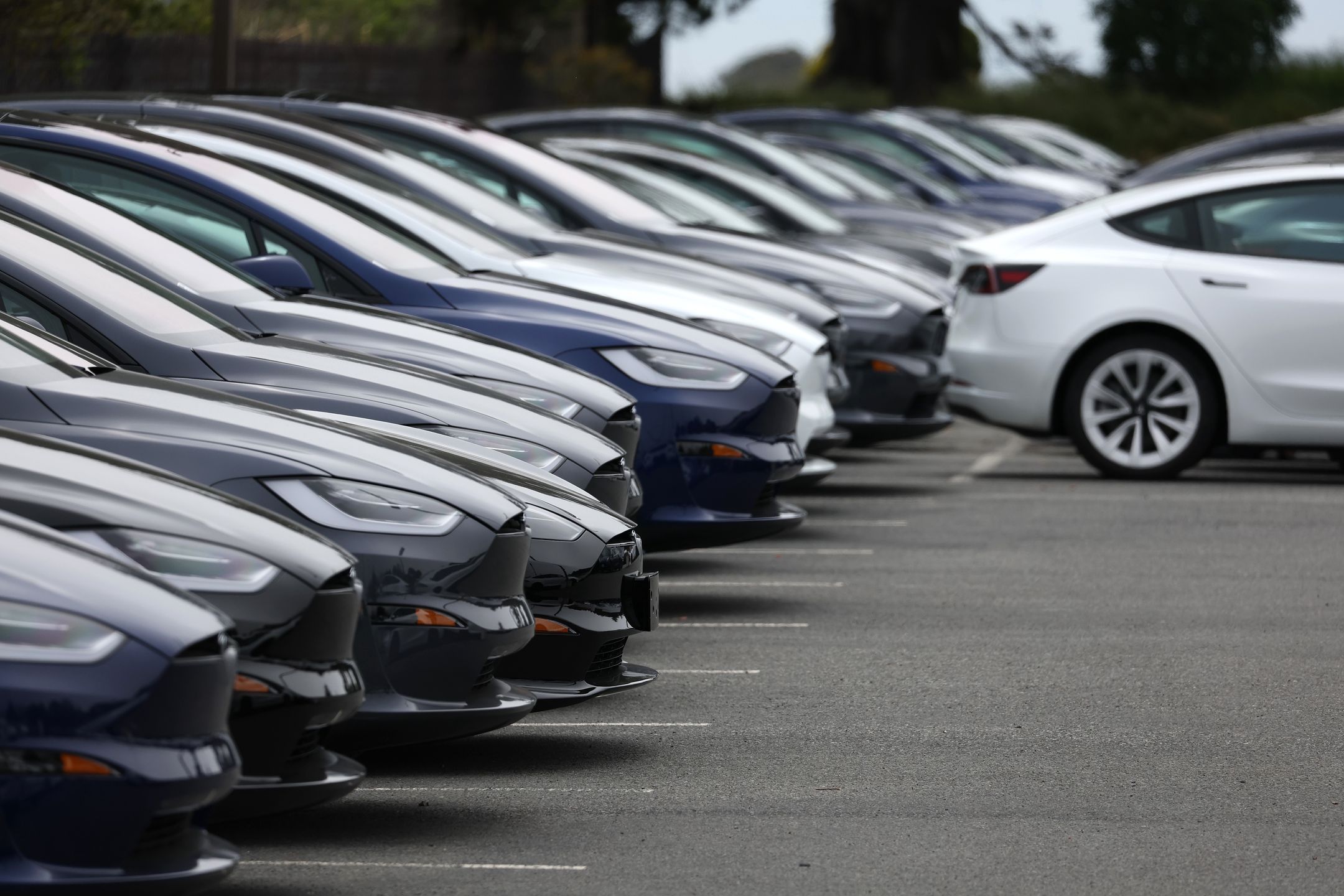 COLMA, CALIFORNIA - MAY 16: Brand new Tesla cars are displayed on the sales lot at a Tesla dealership on May 16, 2023 in Colma, California. According to a report by the U.S. Commerce Department, consumer spending was up in April with help from a strong jobs market and easing inflation. Restaurants and bars saw a 0.6 percent increase in sales and retail sales were up 0.4 percent. (Photo by Justin Sullivan/Getty Images)