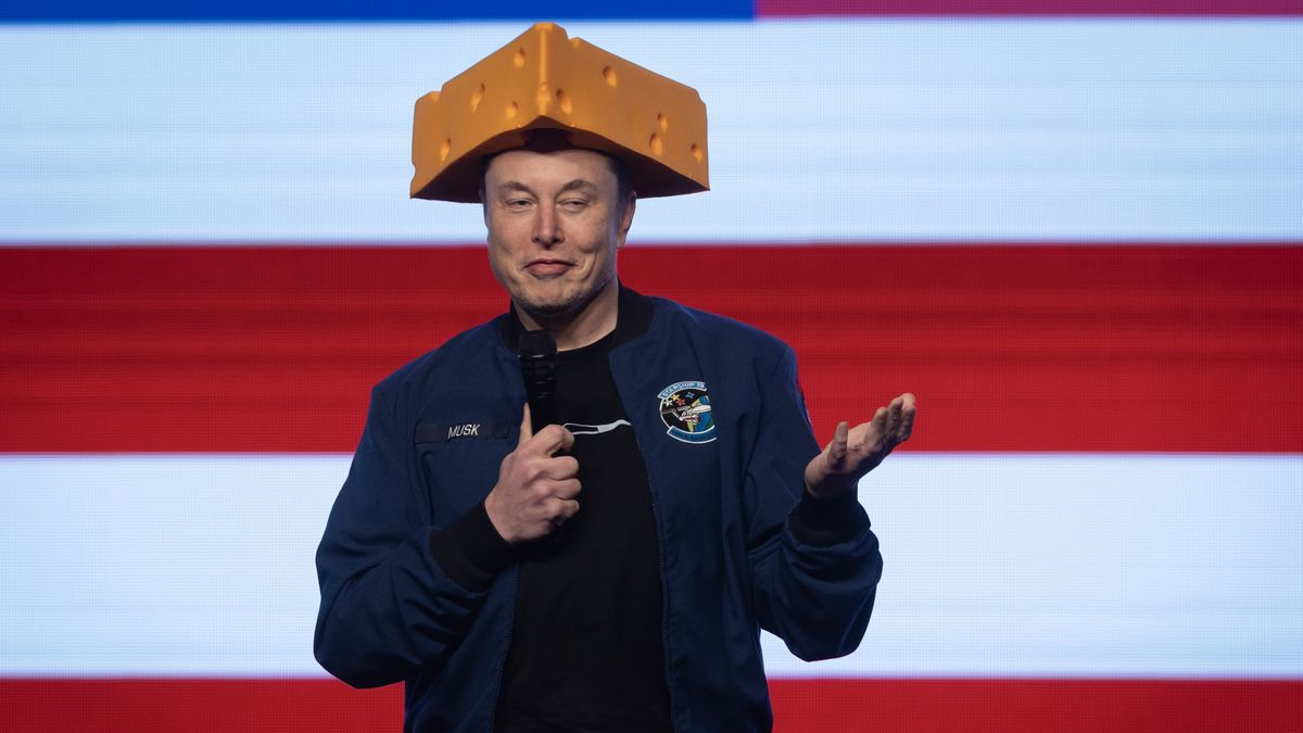 GREEN BAY, WISCONSIN - MARCH 30: Billionaire businessman Elon Musk arrives for a town hall wearing a cheesehead hat at the KI Convention Center on March 30, 2025 in Green Bay, Wisconsin. The town hall is being held in front of the state’s high-profile Supreme Court election between Circuit Court Judge Brad Schimel, who has been financially backed by Musk and endorsed by President Donald Trump, and Dane County Circuit Court Judge Susan Crawford. (Photo by Scott Olson/Getty Images)