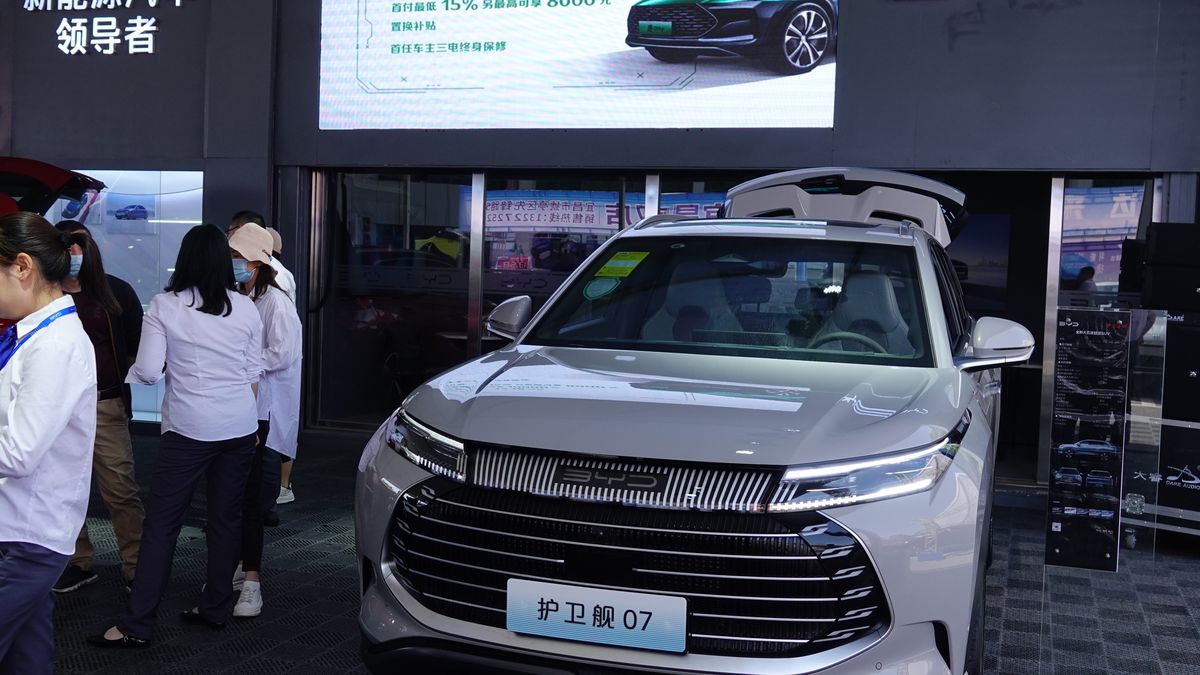 YICHANG, CHINA - MAY 12, 2023 - Citizens look at BYD vehicles displayed at the 2023 Yichang Auto Exhibition in Yichang, Hubei province, China, May 12, 2023. According to the China Association of Automobile Manufacturers, from January to April 2023, China's auto production and sales volume reached 8.355 million and 8.235 million, respectively, up 8.6% and 7.1% year on year. (Photo credit should read CFOTO/Future Publishing via Getty Images)