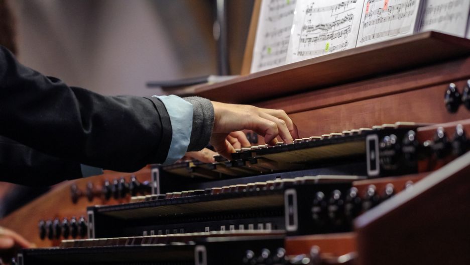 organist playing a pipe organClose up view of a organist playing a pipe organ with motion blur.(c) s.d.organ, music, organist, church, player, manual, keyboard, sacred music, secular music, cathedral, row, arm, console, black, traditional, wood, musical instrument, stops, gothic, piano, craftsmanship, white, step, musician, classical music, spirituality, religious symbol, keys, temple, beauty, pipe organ, religion, antique, wooden, play, stop knobs, concert hall, hand, organ, music, organist, church, player, manual, keyboard, sacred music, secular music, cathedral, row, arm, console, black, traditional, wood, musical instrument, stops, gothic, piano, craftsmanship, white, step, musician, classical music, spirituality, religious symbol, keys, temple, beauty, pipe organ, religion, antique, wooden, play, stop knobs, concert hall, hand