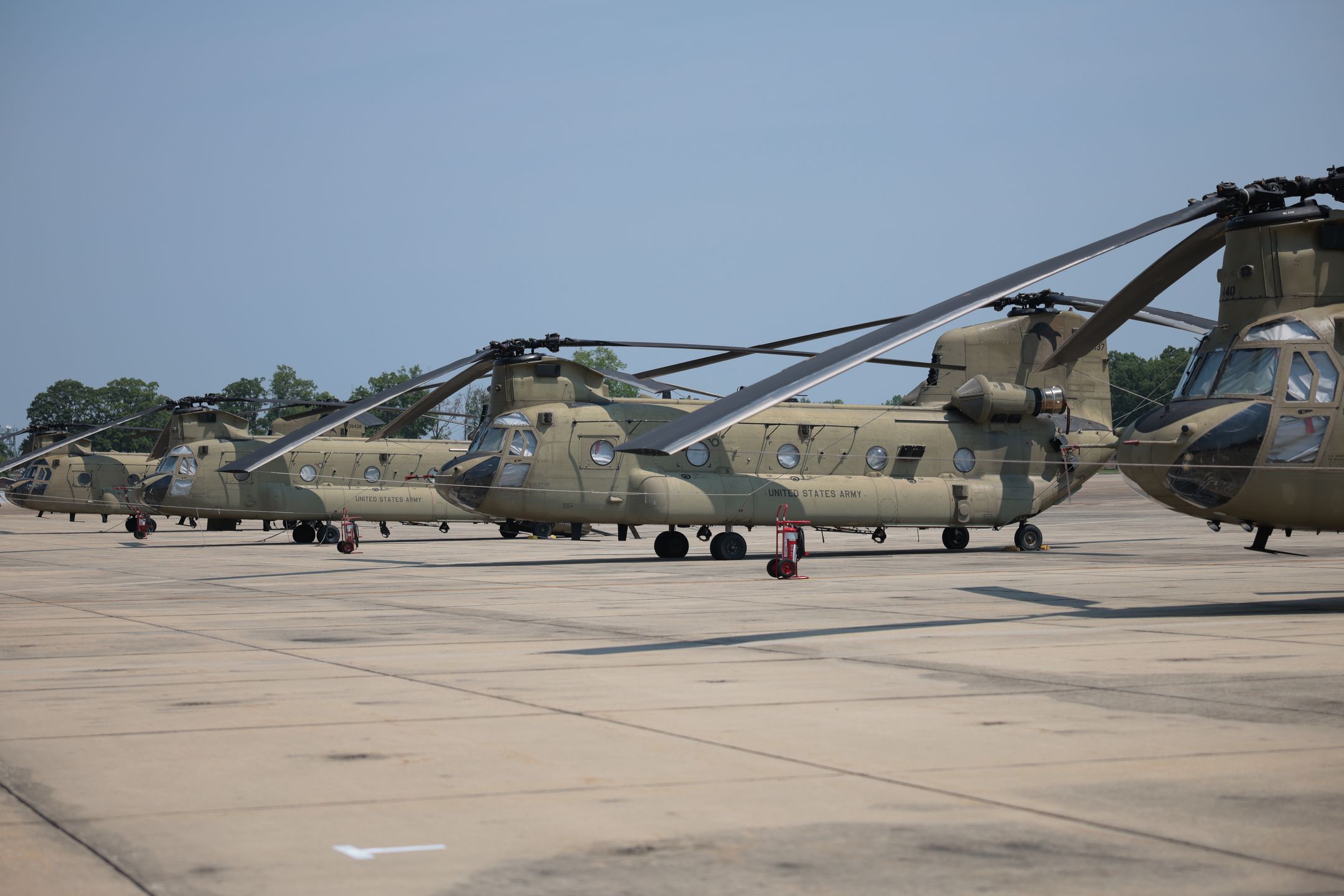 JOINT BASE ANDREWS, MARYLAND - JUNE 12: U.S. Army CH-47 Chinook helicopters sit on the flight line on June 12, 2025 at Joint Base Andrews, Maryland. Army helicopters, including Black Hawks, Apaches, Chinooks, and other military aircraft, will be used in the upcoming U.S. Army's 250th birthday parade, which also coincides with Flag Day and U.S. President Trump's birthday. (Photo by Kayla Bartkowski/Getty Images)