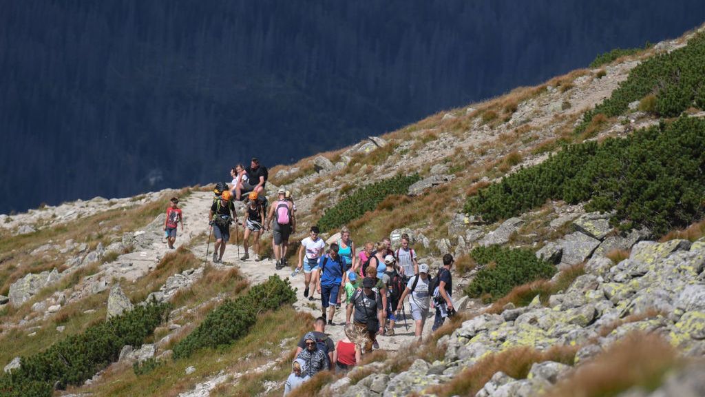 Crowds Of Tourists On The Tatra TrailsTourists walk on a rocky trail direction Kasprowy Wierch.Thanks to the sunny weather at the end of summer holidays, the Tatra trails are under siege with hikers and tourists.On Monday, August 19, 2019, in Zakopane, Lesser Poland Voivodeship, Poland. (Photo by Artur Widak/NurPhoto via Getty Images)NurPhotoaction, geographical destination, holidays, lesser poland voivodeship, polish, polish mountains, polska, tatra, tourists, track, walk, hikers, mountains, popular, recreation, summer holidays, sunny weather, trails, under siege