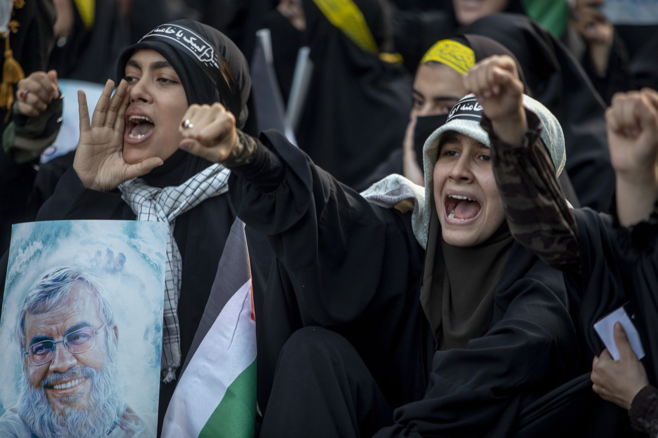 TEHRAN, IRAN - OCTOBER 3: Iranian students take part in a demonstration to show their anger toward the death of Hezbollah Leader Hassan Nasrallah  on October 3, 2024 in Tehran, Iran. Iran launched around 180 ballistic missiles toward Israel on Tuesday night, which came after Israel killed the leader of Hezbollah, the Iran-backed Lebanese militant and political group. (Photo by Majid Saeedi/Getty Images)