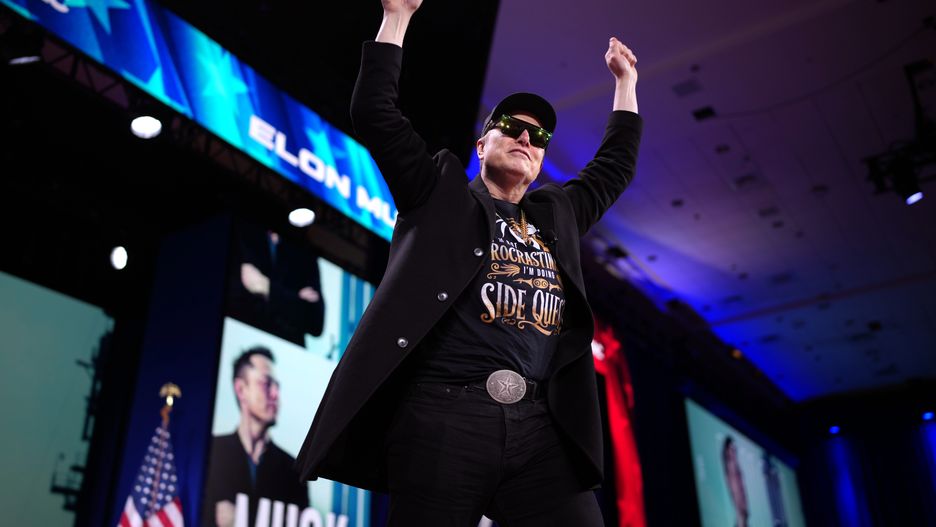 OXON HILL, MARYLAND - FEBRUARY 20: CEO of Tesla and SpaceX Elon Musk arrives on stage at the Conservative Political Action Conference (CPAC) at the Gaylord National Resort Hotel And Convention Center on February 20, 2025 in Oxon Hill, Maryland. The annual four-day gathering brings together conservative U.S. lawmakers, international leaders, media personalities and businessmen to discuss and champion conservative ideas. (Photo by Andrew Harnik/Getty Images)