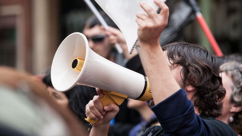 Unidentified young demostrator with megaphone and notebook protesting against austerity cuts
megaphone, demonstrator, protester, young, worker, strike, spain, manifestation, labor reform, cuts, crowd, politics, flags, flags, labor, banners, strike, street, urban, demonstration, protest, people, action, unions, society, unemployed, notebook