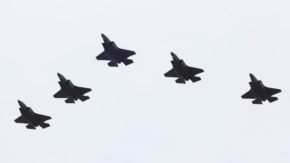 ZANDVOORT, NETHERLANDS - AUGUST 31: A flight of 5 Lockheed F-35A Lightning IIs of the Royal Netherlands Air Force fly over the grid prior to the F1 Grand Prix of Netherlands at Circuit Zandvoort on August 31, 2025 in Zandvoort, Netherlands. (Photo by Andrew Ferraro - Formula 1/Formula 1 via Getty Images)