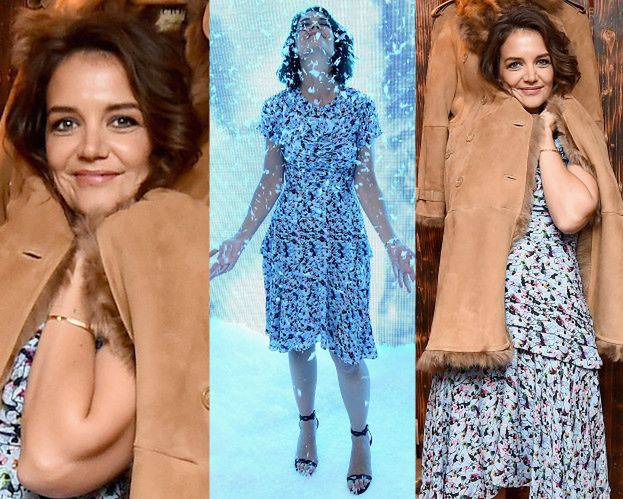 Katie Holmes wtula się w kożuch zawieszony na ścianie sztucznej stodoły...