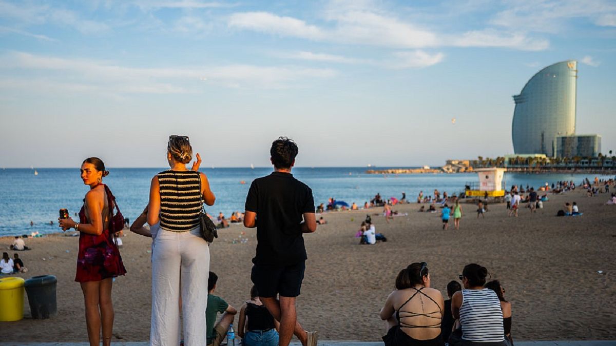 Barceloneta promenade with the W Hotel in the background
Barceloneta beach promenade with the W Hotel in the background, Barcelona, Spain. (Photo by: Nano Calvo / VWPics/ Universal Images Group via Getty Images)
VW Pics
coastal promenade, sunny day, enjoying, oceanfront, seaside walkway, sea breeze, mediterranean coast, famous hotel, beach atmosphere, w hotel, seaside leisure, beachfront, coastal urban area, popular landmark, iconic hotel, summer vibes, scenic promenade, city skyline, urban seaside, urban relaxation, beach promenade view, beachgoers, waterfront view, views, barcelona waterfront, city beach scene, outdoor recreation, beach life, beachside walkway, coastal city, beachside stroll, urban coastline, urban tourism, coastal lifestyle, tourist attraction, waterfront destination, barcelona, beach promenade, modern architecture, city beach