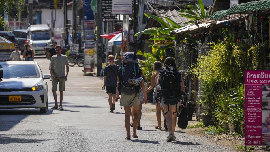 Temporary
Backpacker foreign tourists roam around in Vang Vieng, Laos, Friday, Nov. 22, 2024. (AP Photo/Anupam Nath)
Anupam Nath