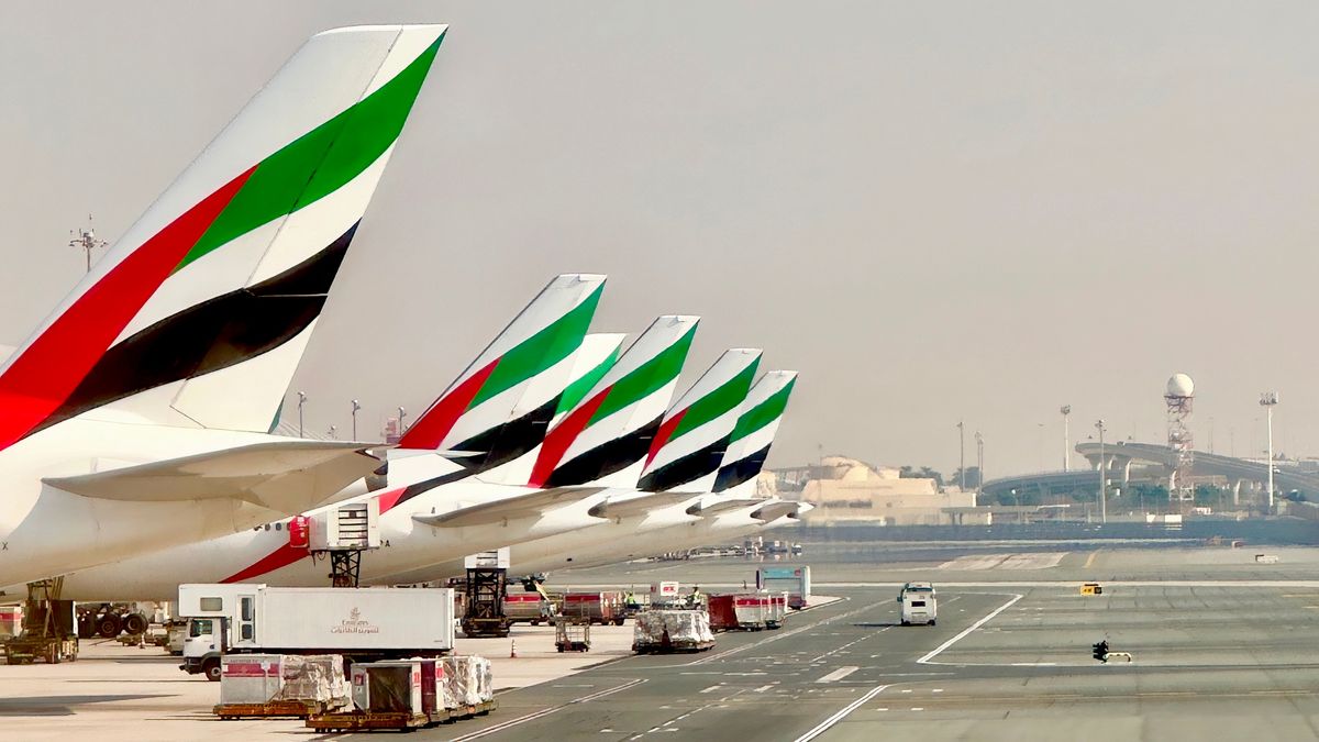 emirates, dubai, airport, airplane, travel, flight, plane, terminal, transportation, city, break, departure, journey, trip, passenger, arrival, tourism, vacation, tailfin, tourist, modern, business, aircraft, transport, international, airline, fleet, air, boarding, gate, jet, aviation, building, sky, holiday, architecture, flying, destination, fly, airliner, transit, aeroplane, united arab emirates, hub, global, row, stabilizer, vertical